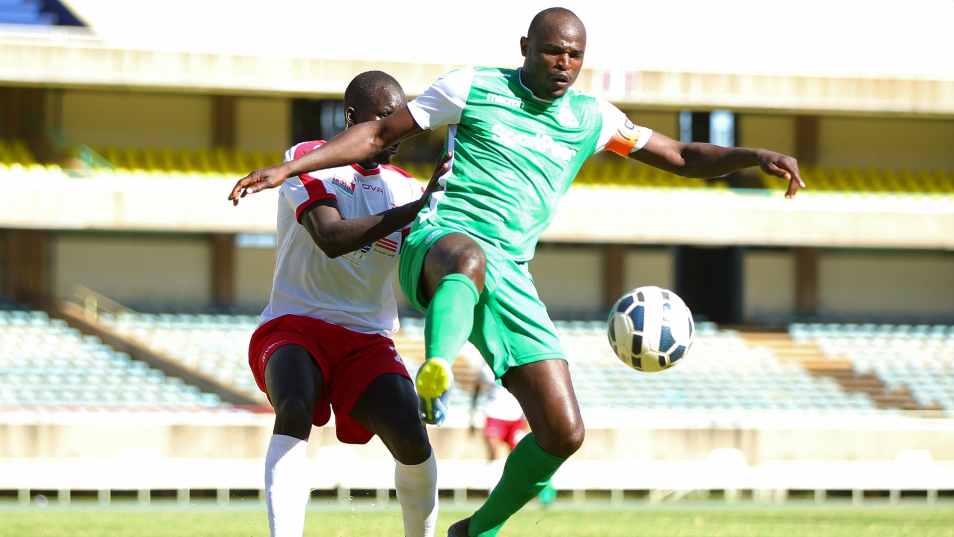 Gibert Osonga of Posta Rangers v Dennis Oliech of Gor Mahia.