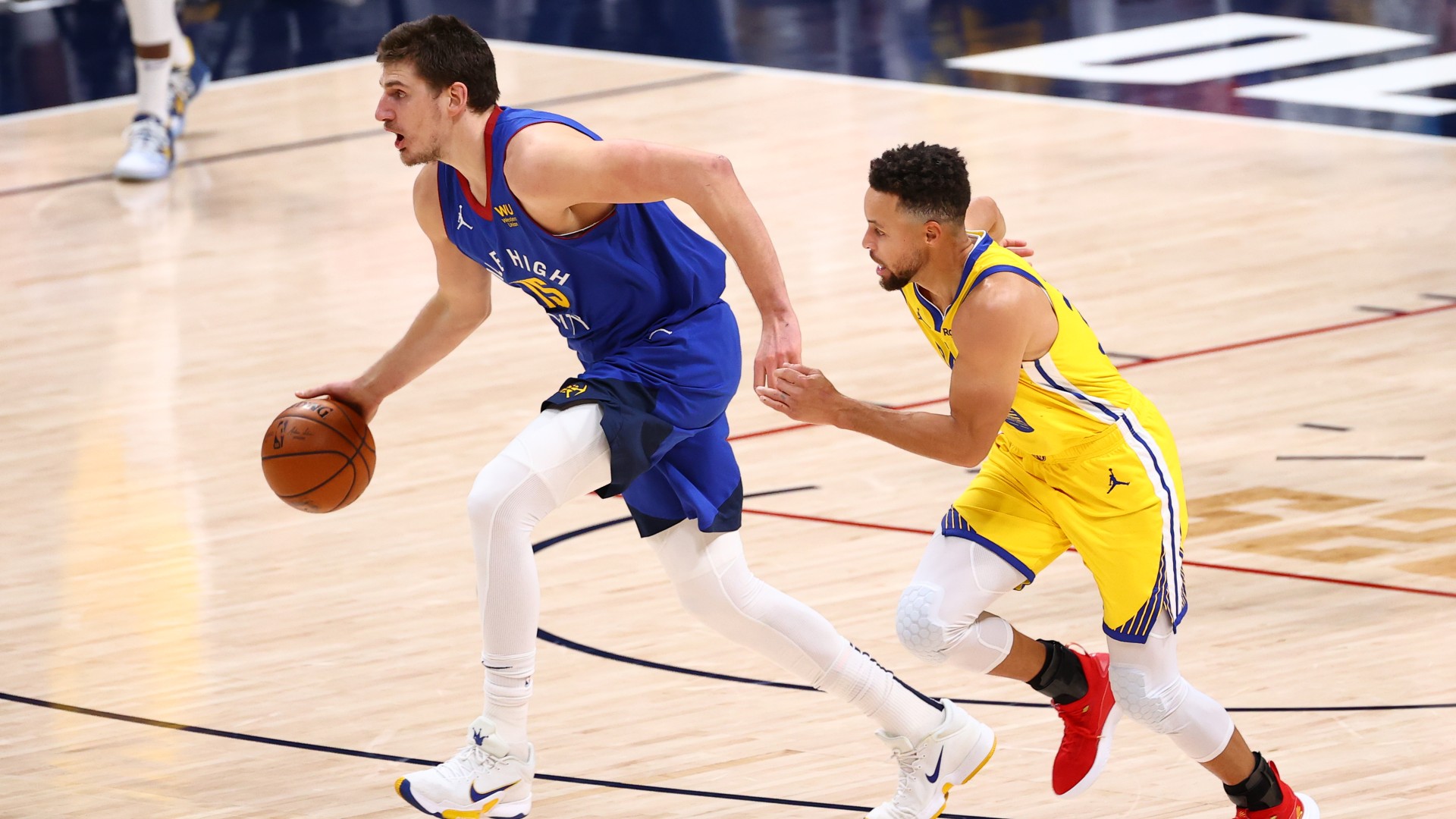 nikola-jokic-stephen-curry-getty-052021-ftr.jpg