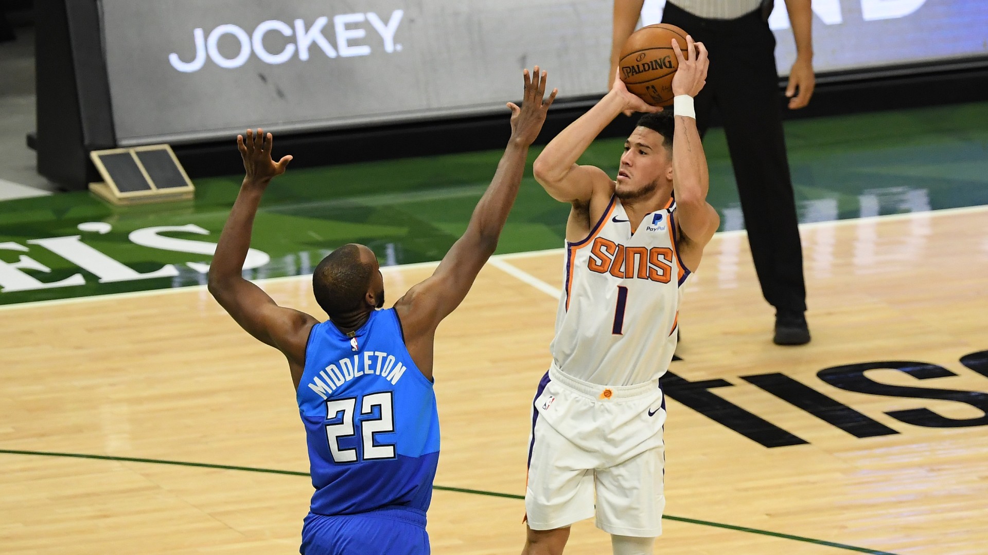 khris-middleton-devin-booker-getty-070621-ftr.jpg